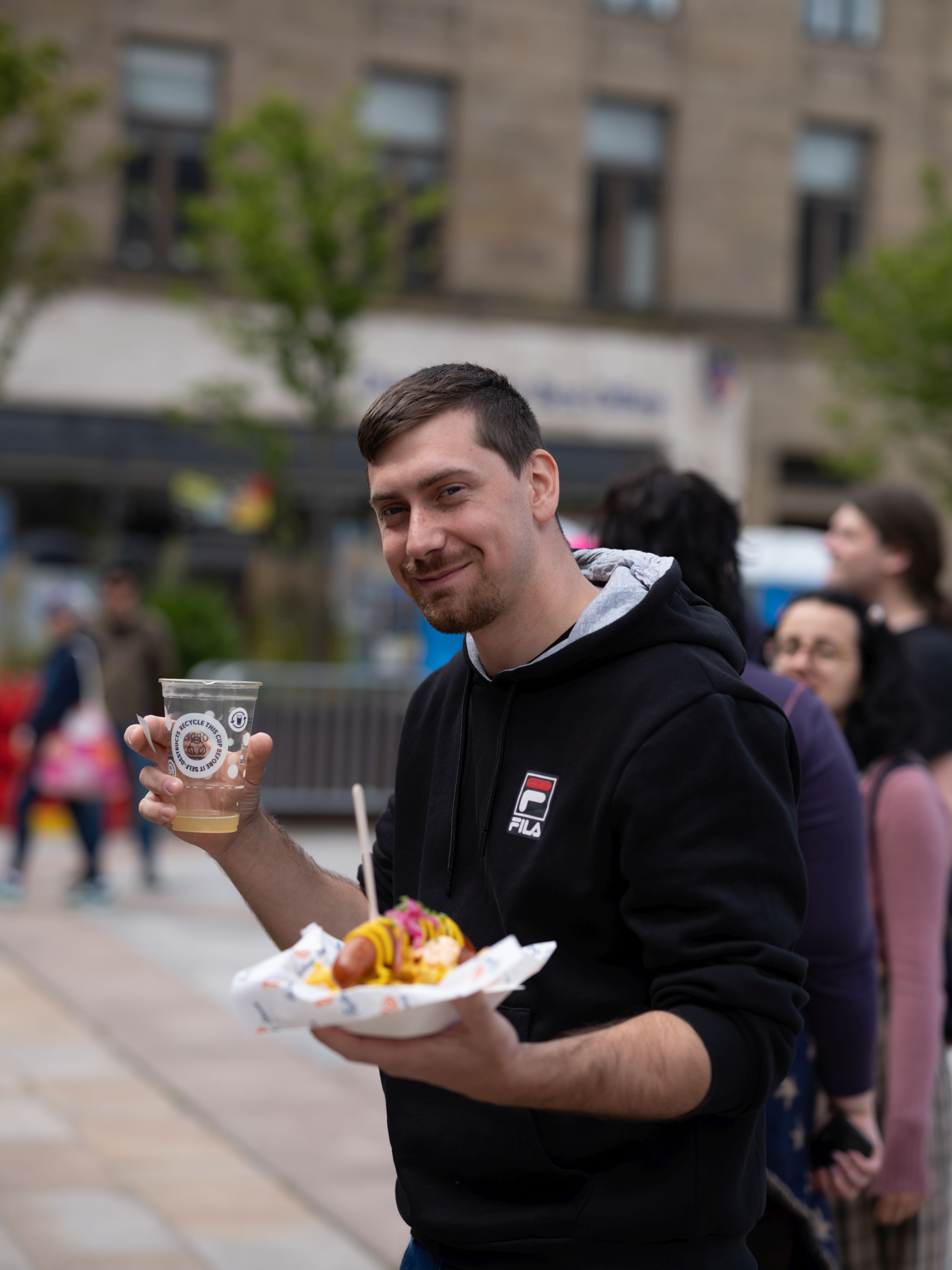 Man with hotdog